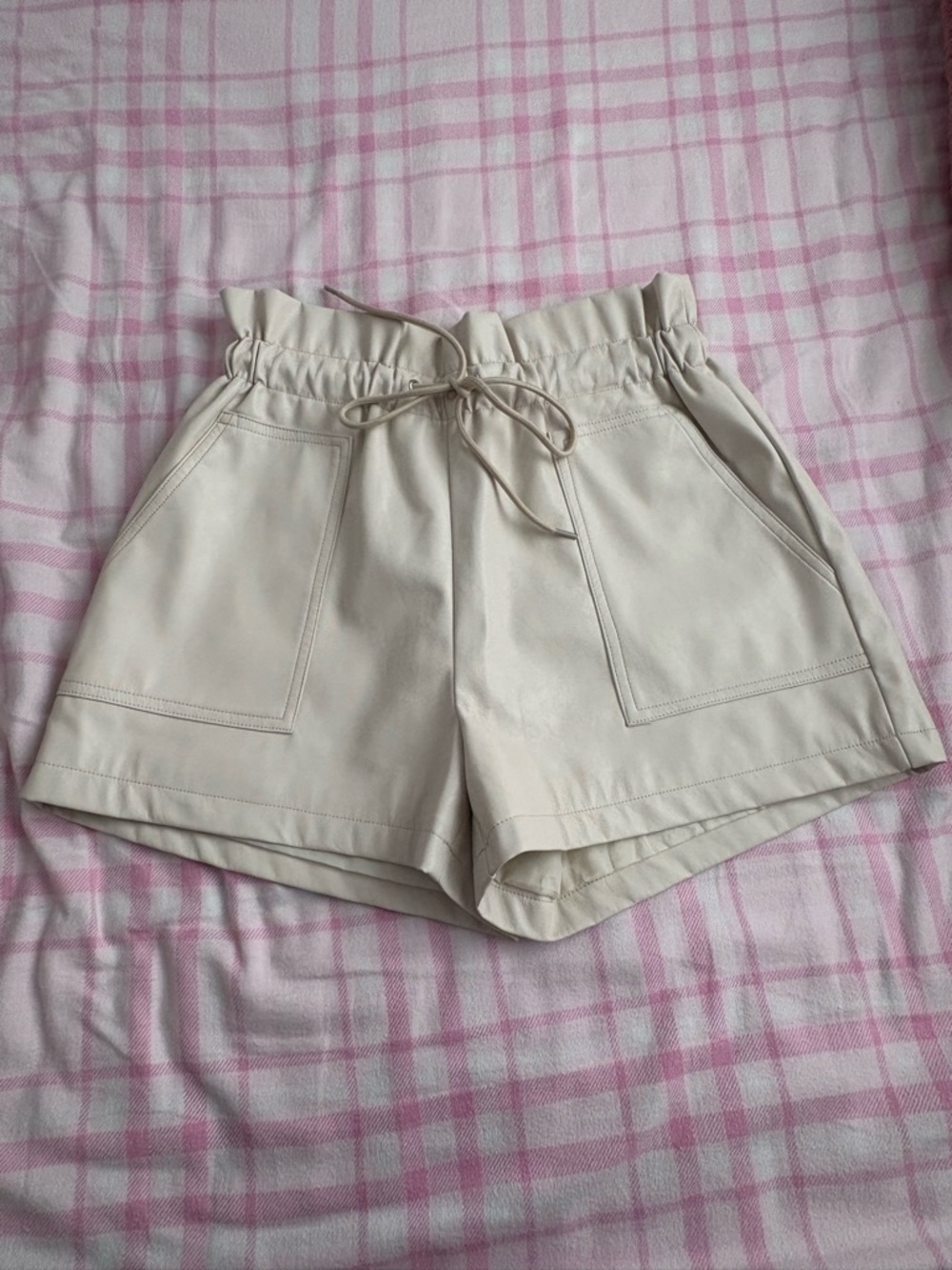 Pink leather shorts